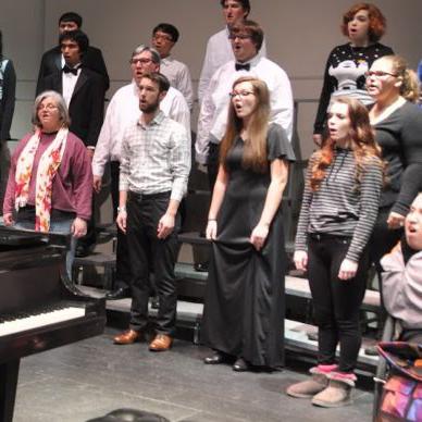 Choir members in concert